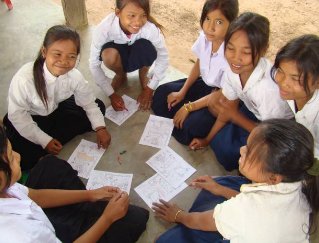 Girls at Banteay Chmar Village in Cambodia also love to color the Manna for Chiildren books